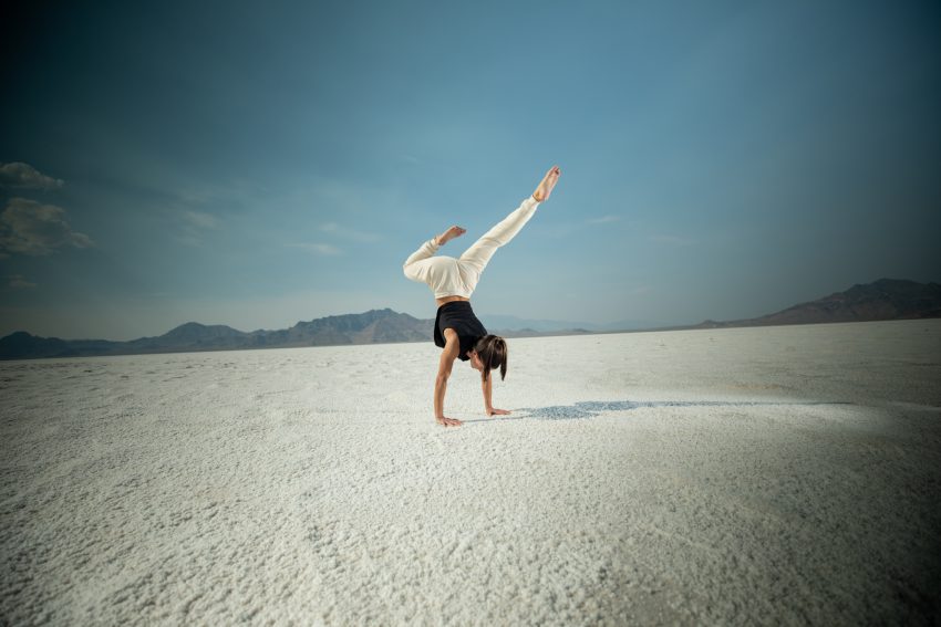 yogi practices handstand, an advanced arm balance